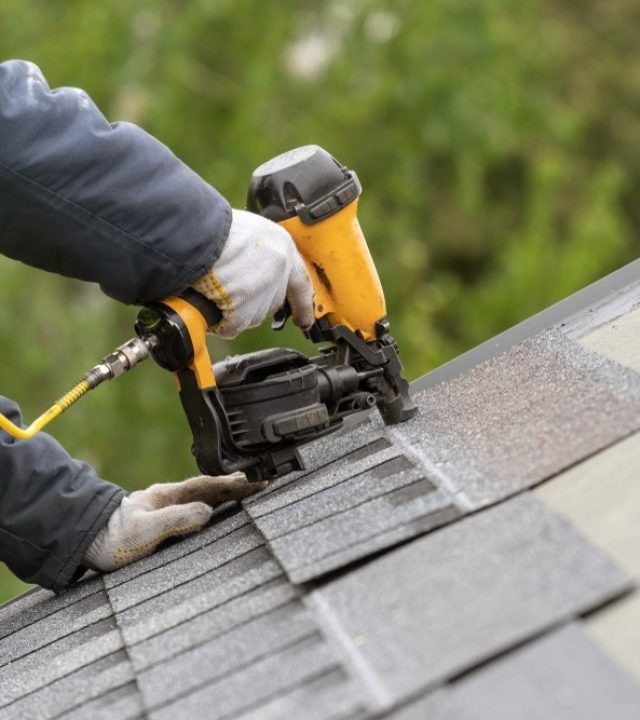 Professional roof repair services being performed on a home in Westchester County, NY.