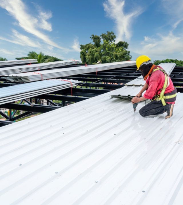 Professional-roofers-during-a-commercial-roof-replacement.–1030×687 Expert roof replacement team working on a home in Westchester County, NY.