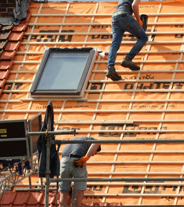 roof installation Commercial roofing specialists installing a durable roof in Westchester County, NY.